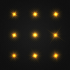 Set of shining golden stars. Light Effect Bright Star, Christmas Star. Golden glowing light explodes on a transparent background.