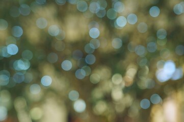 Blurry abstract background. Festive decorations in the mall. Festive background. Event. Christmas and New Year.