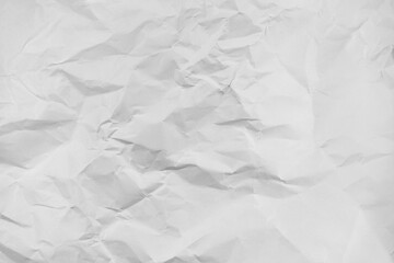 White crumpled paper texture background, clean white wrinkled paper, top view.