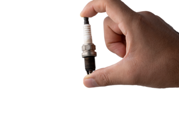 hand holding a motor engine spark plug