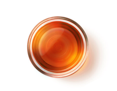 Top View Of Sesame Oil In Glass Bowl Isolate On White Background. Clipping Path.