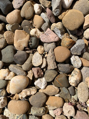 Background texture from river stones close up