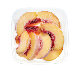 Plastic container with frozen slices of peaches. Top view of frozen fruits isolated on white...