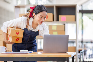 SME entrepreneur Small business entrepreneurs Online selling ideas,Happy Young Asian business owner...