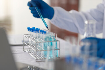 Scientists work with in vitro reagents in laboratories and draw conclusions from their research.