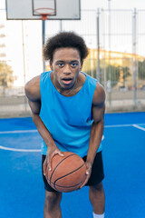 Portrait of a basketball player looking at camera