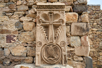 Old armenian carved khachkar with a cross