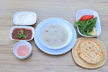 Soup is a primarily liquid food, generally served warm or hot (but may be cool or cold), that is made by combining ingredients of meat or vegetables with stock, milk, or water