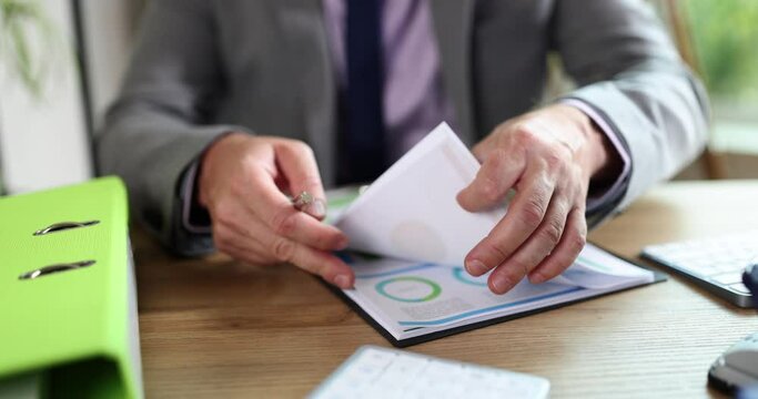 Business man hand working with financial business graph information.