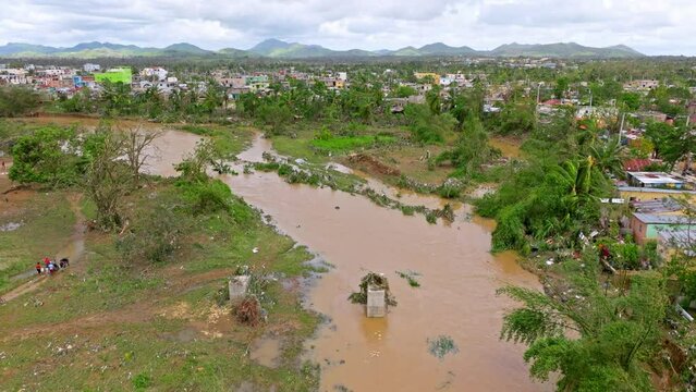 Yuma River flooding and destruction of Los Platanitos community in Dominican Republic after hurricane Fiona. Aerial drone view