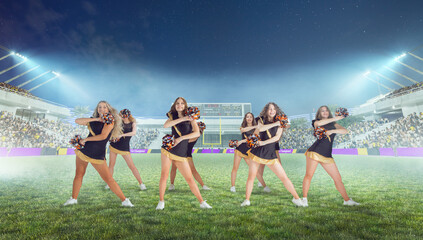 Obraz premium Group of cheerleaders in action on stadium in night