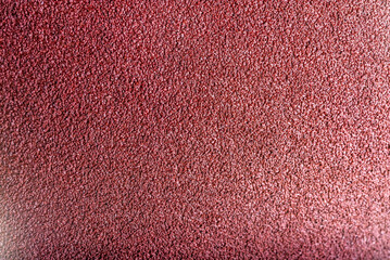Fototapeta premium matte grungy sandpaper background closeup