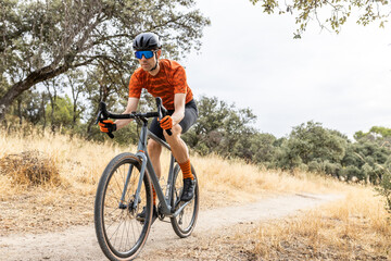 gravel bike orange - Powered by Adobe