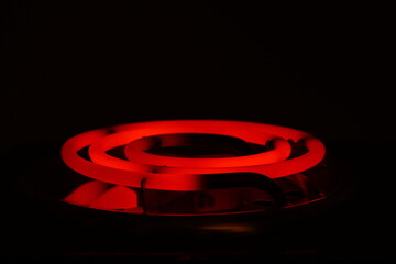 electric stove red spiral warming up