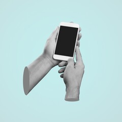 Mobile phone with blank screen in human hands