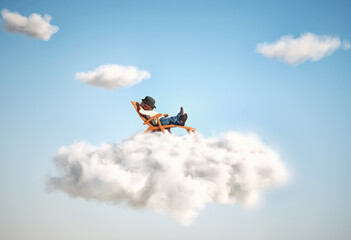 Fototapeta na wymiar Man relaxing on a cloud. Contemplation and aspirations concept.