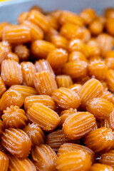 Close-up view of Tulumba dessert with sherbet