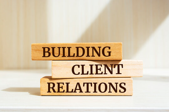 Wooden blocks with words 'Building Client Relations'. Business concept
