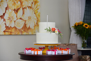 cake with candles and flowers