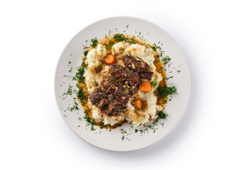 Beef cheeks with mashed potatoes on white plate, white background.