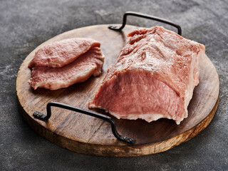 Big piece of the fresh uncooked pork loin. Meat, pork, slices pork loin.