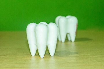 dental treatment for restoring teeth, two big teeth on the dentist's tables