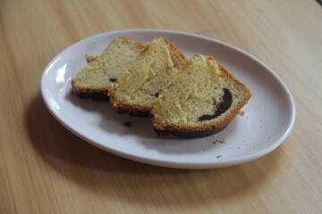 Sponge or sponge cake is a cake made from flour, sugar, and eggs. Sponge cakes and cakes are generally cooked by baking in the oven, although there are also steamed sponges