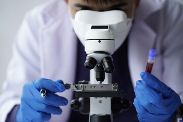 Lab worker preparing test blood for detection of antibodies and infections Corona virus.
