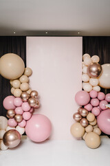 Wedding reception. Arch on background balloons, party decor. Photo-wall decoration space or place...