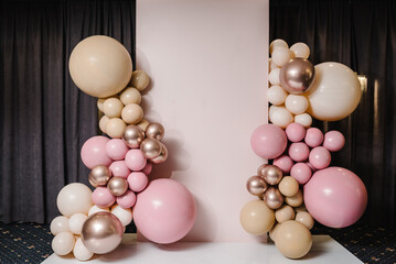 Wedding reception. Arch on background balloons, party decor. Photo-wall decoration space or place with pink, brown, and gold balloons. Trendy autumn decor. Celebration baptism concept. Birthday party. - obrazy, fototapety, plakaty