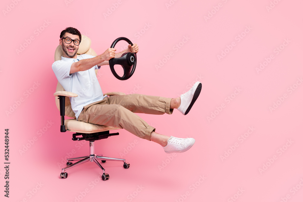 Poster Full body photo of manager guy hold steering wheel imagine road trip after work weekend isolated pastel color background