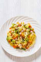 Ham and Noodle Casserole on white plate, top view