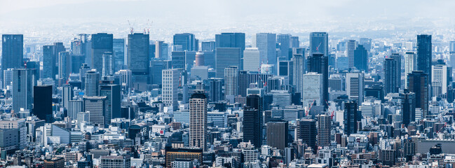 Naklejka premium 高層ビルの上から見える大阪の街並み