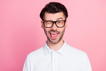 Closeup photo of young bearded handsome positive guy toothy smile excited blink eye playful macho hint isolated on bright pink color background