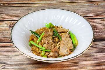Stir fried rice noodles with soy sauce, Thai food Pad See Ew.