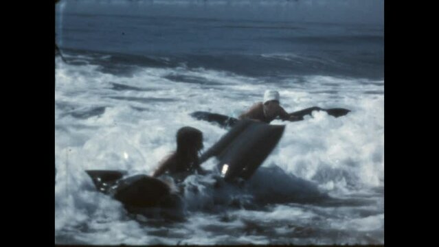 Playing in the Surf 1968 - A mother and her children play in the surf at El Capitan State Beach in California, 1968.