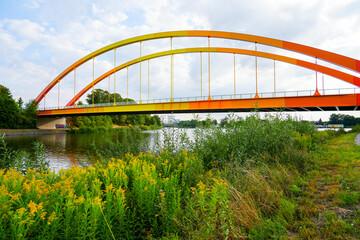 Bridge Dattelner Meerbogen near Datteln on the canal. Arched bridge in bright colors on the Dattelner Meer.
