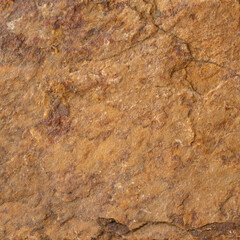 close up antique background  texture of old beige brown natural stone wall backdrop decoration with  copy space.idea for vintage or retro,construction architecture design.