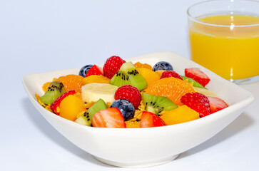 Healthy fresh fruit salad in a bowl