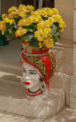Sicilian ceramic human head vase - obrazy, fototapety, plakaty