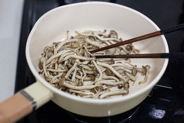 fried mushrooms on a frying pan
