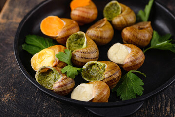 Baked snails Escargot with bread