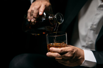 Businessmen in suits drinking  Celebrate whiskey