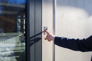 opening front door of house by fingerprint. modern smart digital technologies. biometric lock.
