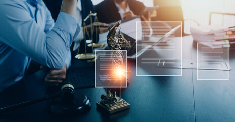 Justice and law concept.Male judge in a courtroom with the gavel, working with, computer and docking keyboard, eyeglasses, on table in morning light