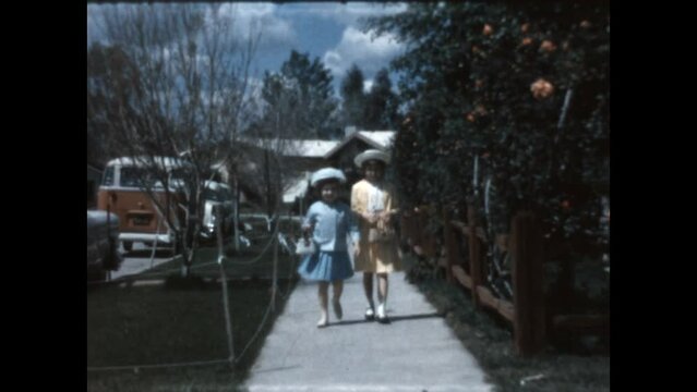 Easter Dresses 1965 - Sisters show off their Easter dresses in Canoga Park, California in 1965. 