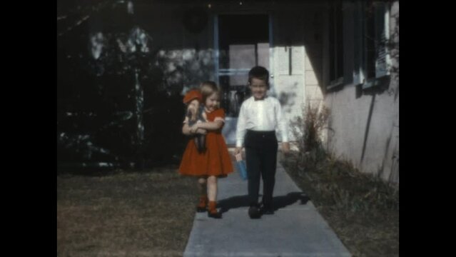 Easter Outfits 1965 - Siblings model their Easter outfits in Canoga Park, California in 1965.