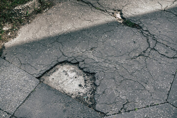 A pothole on asphalt road