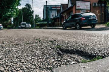 A pothole on asphalt road
