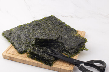 Korean seaweed on a chopping board. laver © bong